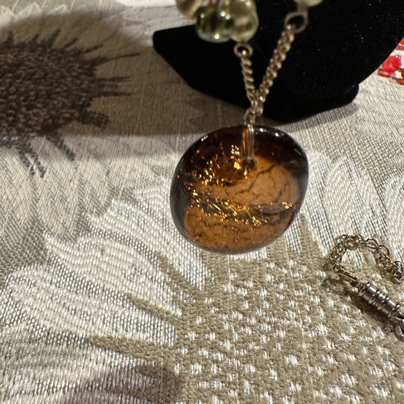 Beautiful amber stone hangs from chain with delicate clusters of small beads. - Picture 7 of 13